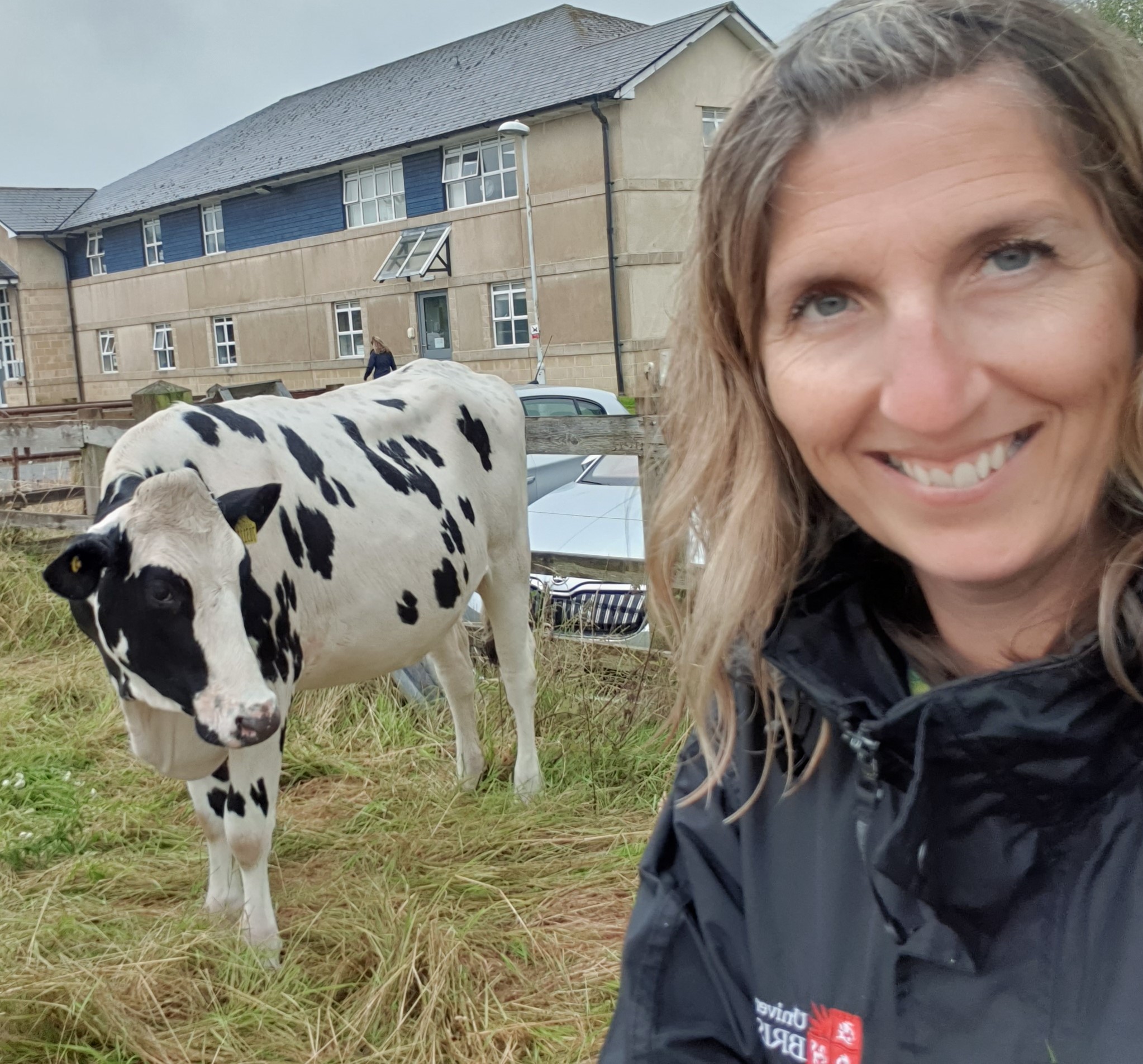 Farm Technician Gemma Richards with a cow